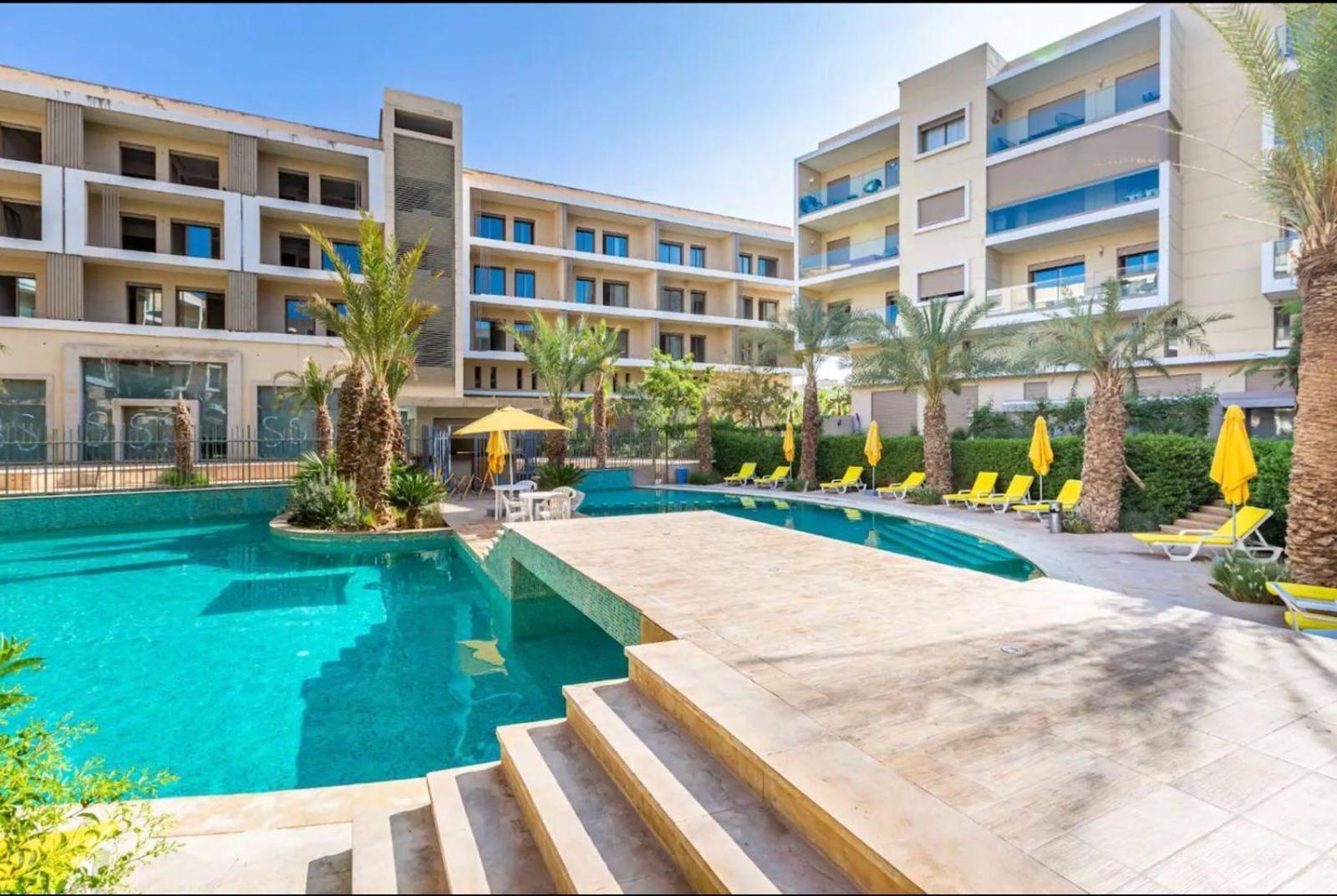 Appartement Luxueux Avec Piscine 10 Minutes Du Centre Ville Marrakesh Buitenkant foto